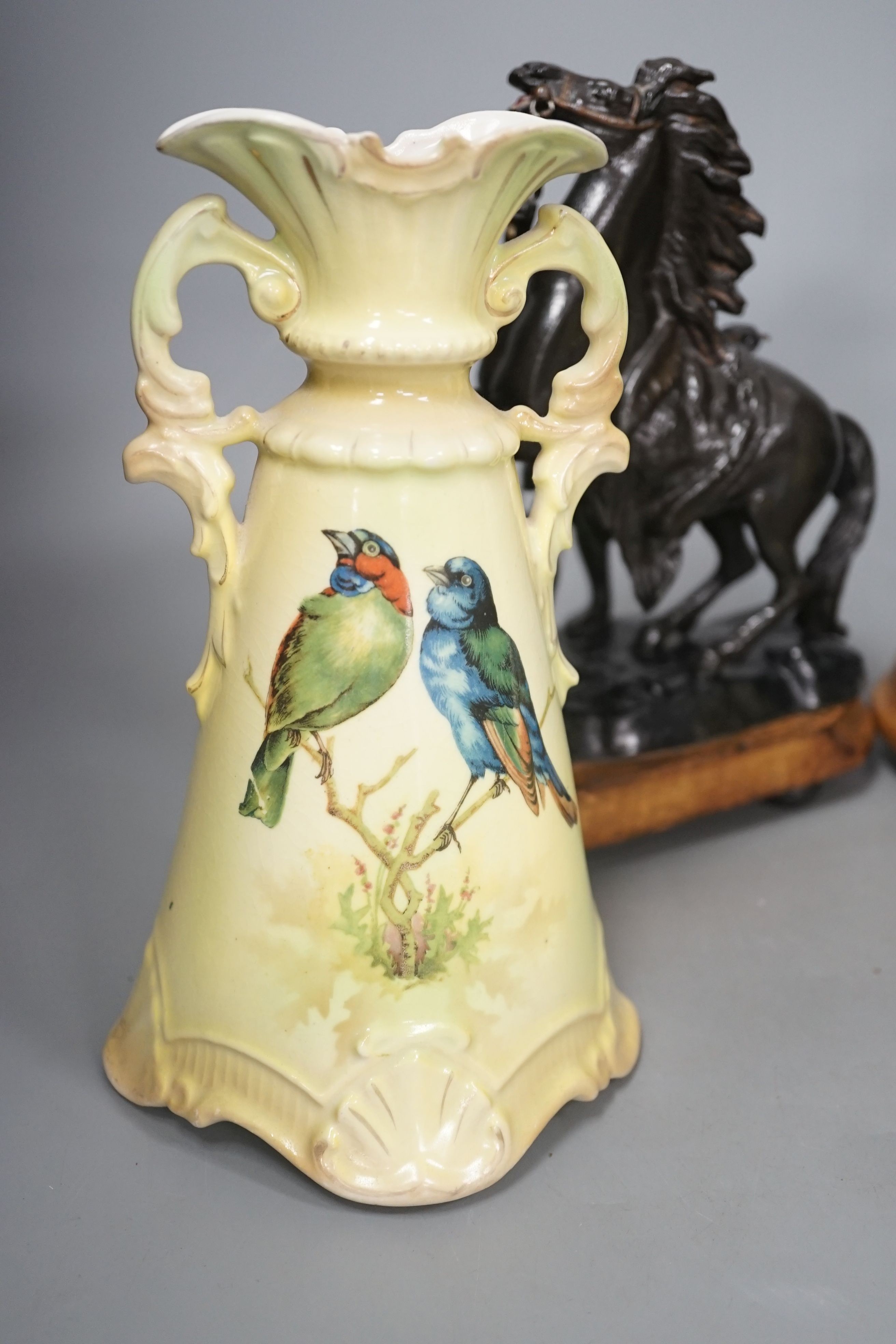 A small pair of painted spelter Marly horses and a pair of Austrian ceramic vases, tallest 23cm